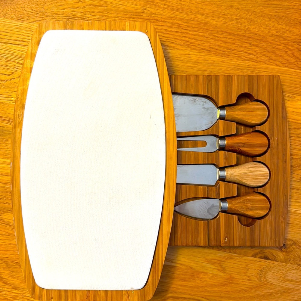 Cheese board and knives.